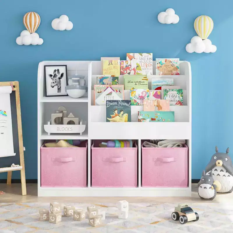 Libreria, scaffale multifunzionale con 3 cassetti pieghevoli in tessuto, espositore per cameretta e sala giochi, bianco rosa